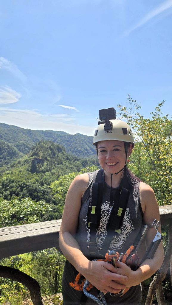 Girl on a Canyon Rim Zipline Tour